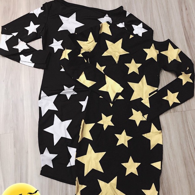 Đầm thun in sao lệch vai body