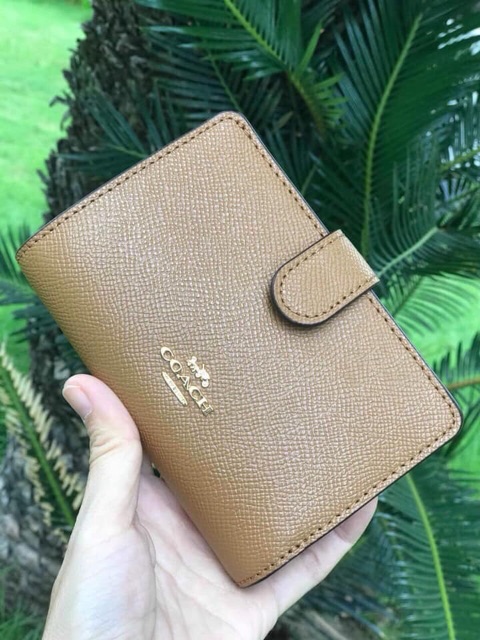 Ví cầm tay Coach 9*13cm hàng chính hãng