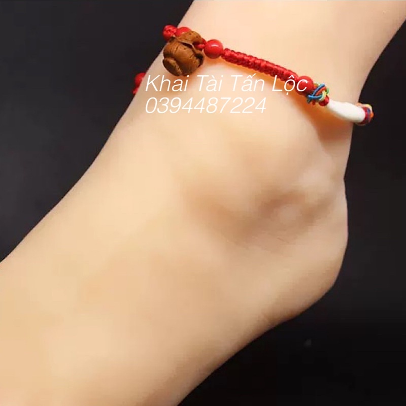 Lắc chân , vòng chân dây đỏ nanh chó mực bình an