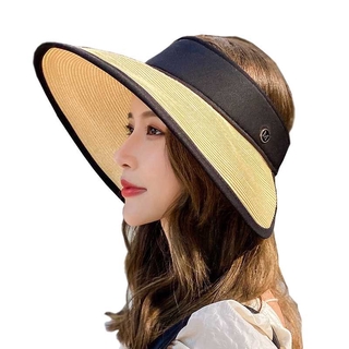 Wide-brimmed straw hat with open top to help protect women from the sun when going to the beach