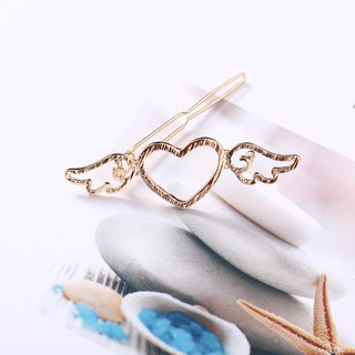 Kẹp tóc trái tim tình yêu màu vàng MS266