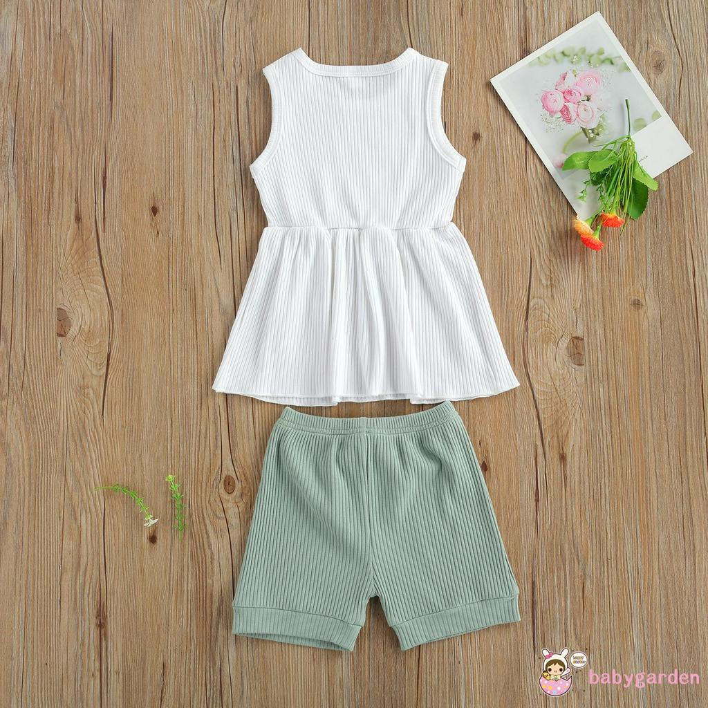Bộ áo không tay cổ tròn và quần short bằng vải thun gân cho bé gái từ 2-7t