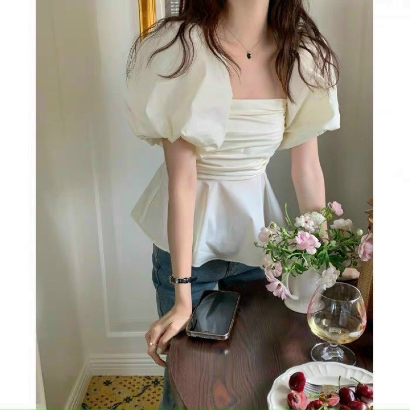Áo peplum trắng nhún ngực bẹt vai tay phồng