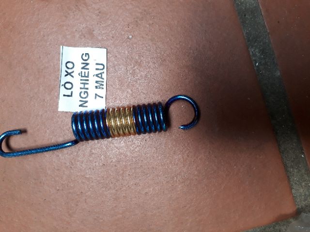 Lò xo chân trống titan