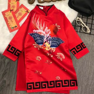 Áo dài bé trai chat lieu vai lua men