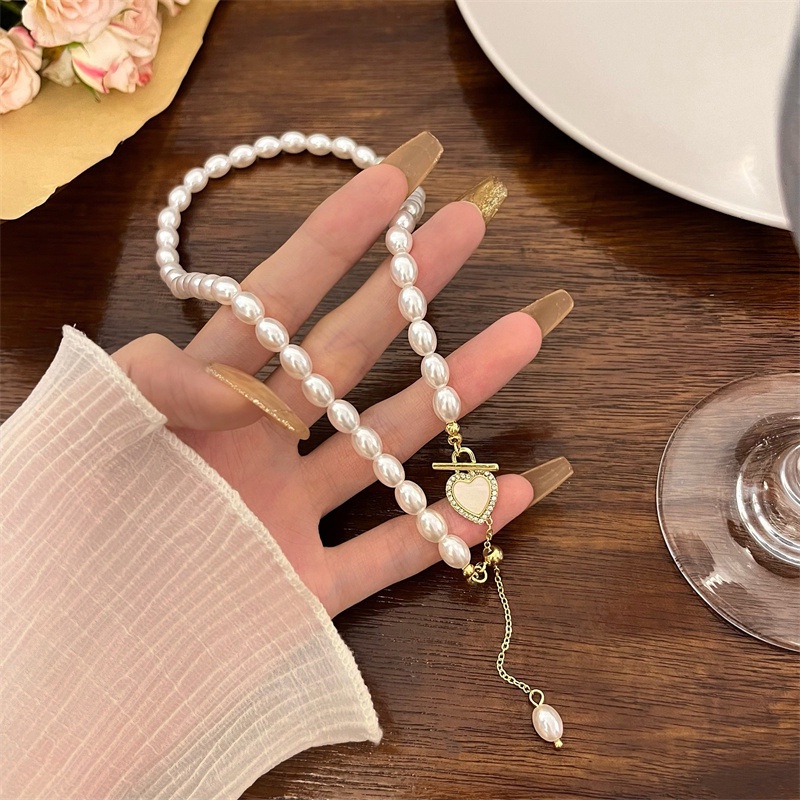 dây chuyền choker nữ chuỗi ngọc nhân tạo trái tim cực sang trọng