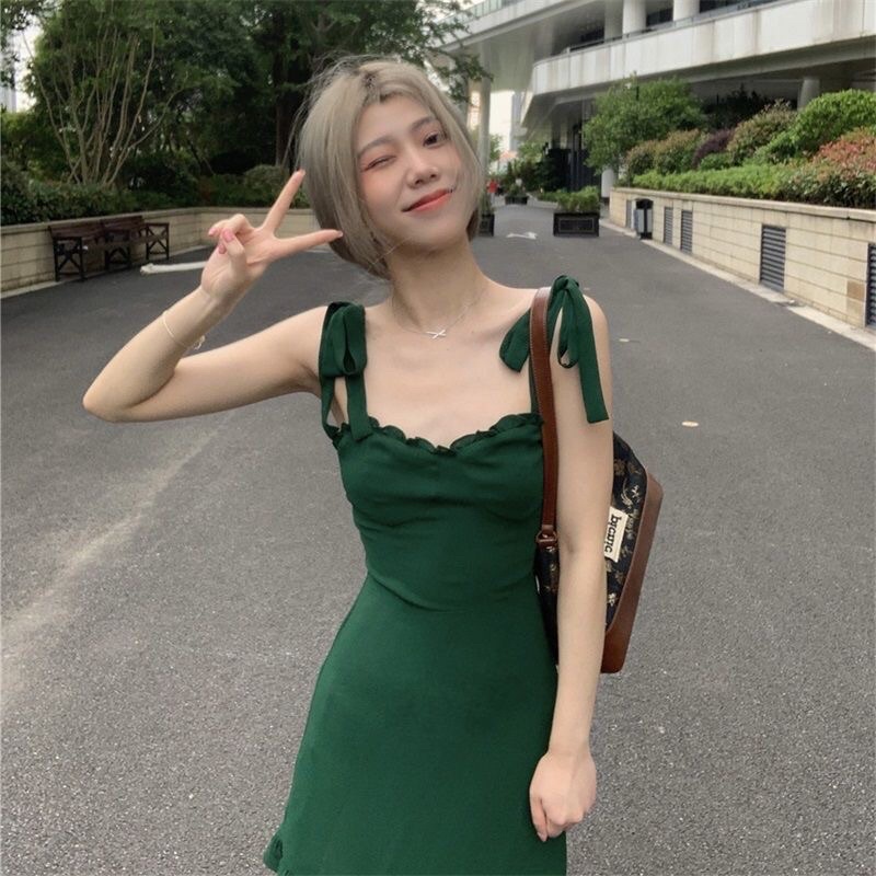 Đầm hai dây cột nơ dáng ôm màu xanh phong cách năng động cho nàng 11