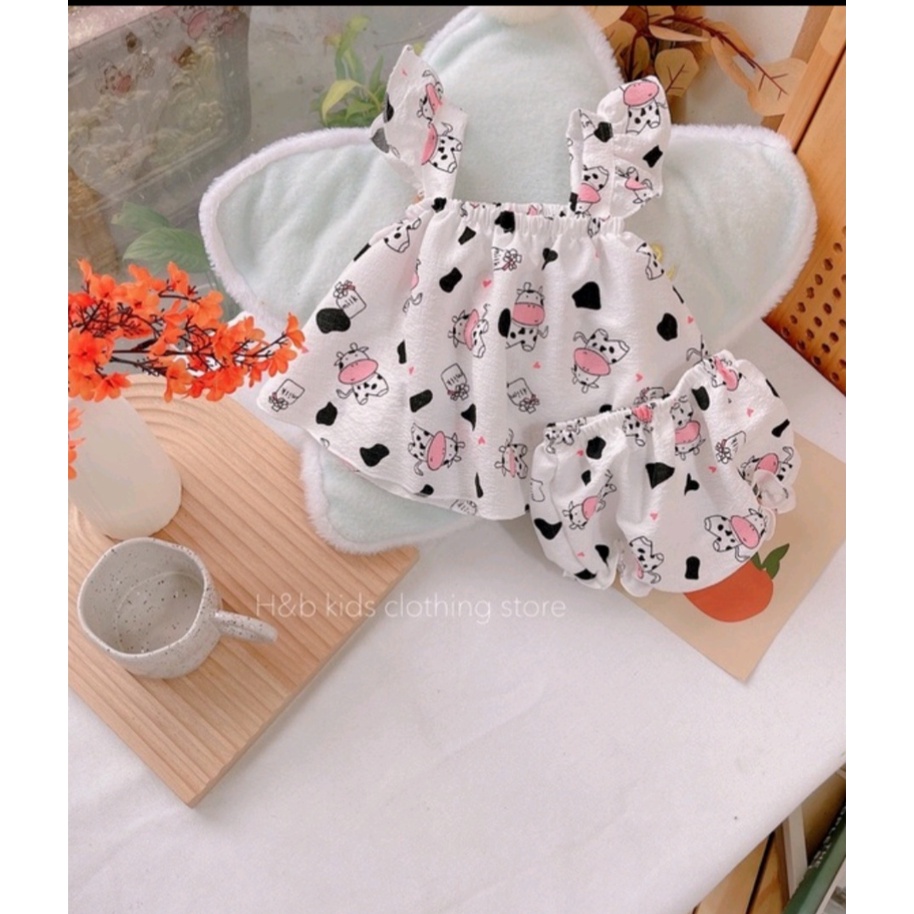 Bộ đồ hai dây cánh tiên vải đũi xốp họa tiết đáng yêu cho bé gái từ 6 – 16kg