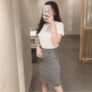 Chân váy ôm có túi trên gối