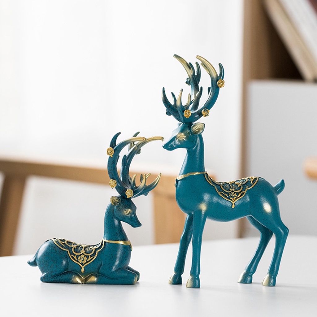 2 tượng hình con nai may mắn làm đồ trang trí