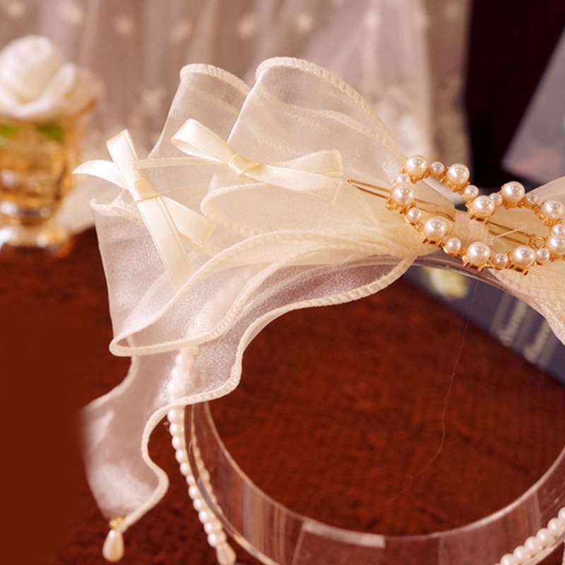 Băng đô nơ đính ngọc trai giả phong cách Lolita
