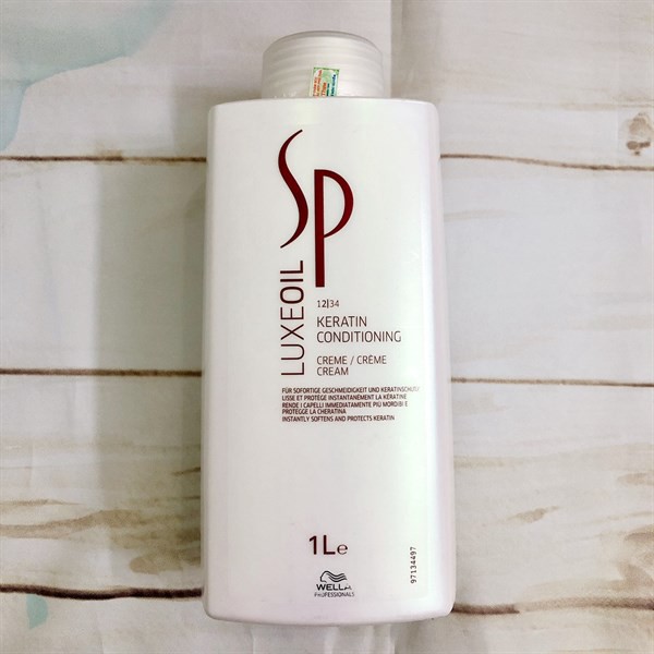 Dầu xả Wella SP Luxe Oil Keratin conditioning siêu mượt cho tóc hư tổn 1000ml