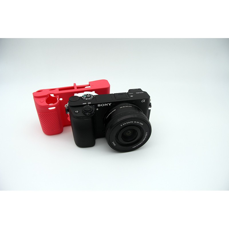 Vỏ silicon cho máy sony A6000/A6300.( 4 MÀU : Đen, hồng ,màu lính,vàng