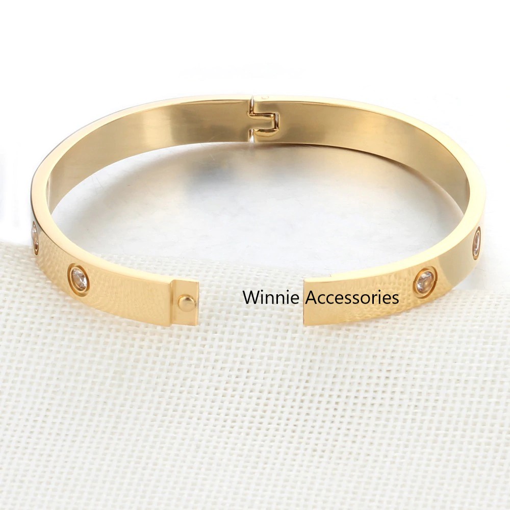 Vòng tay nữ titan love vàng gold
