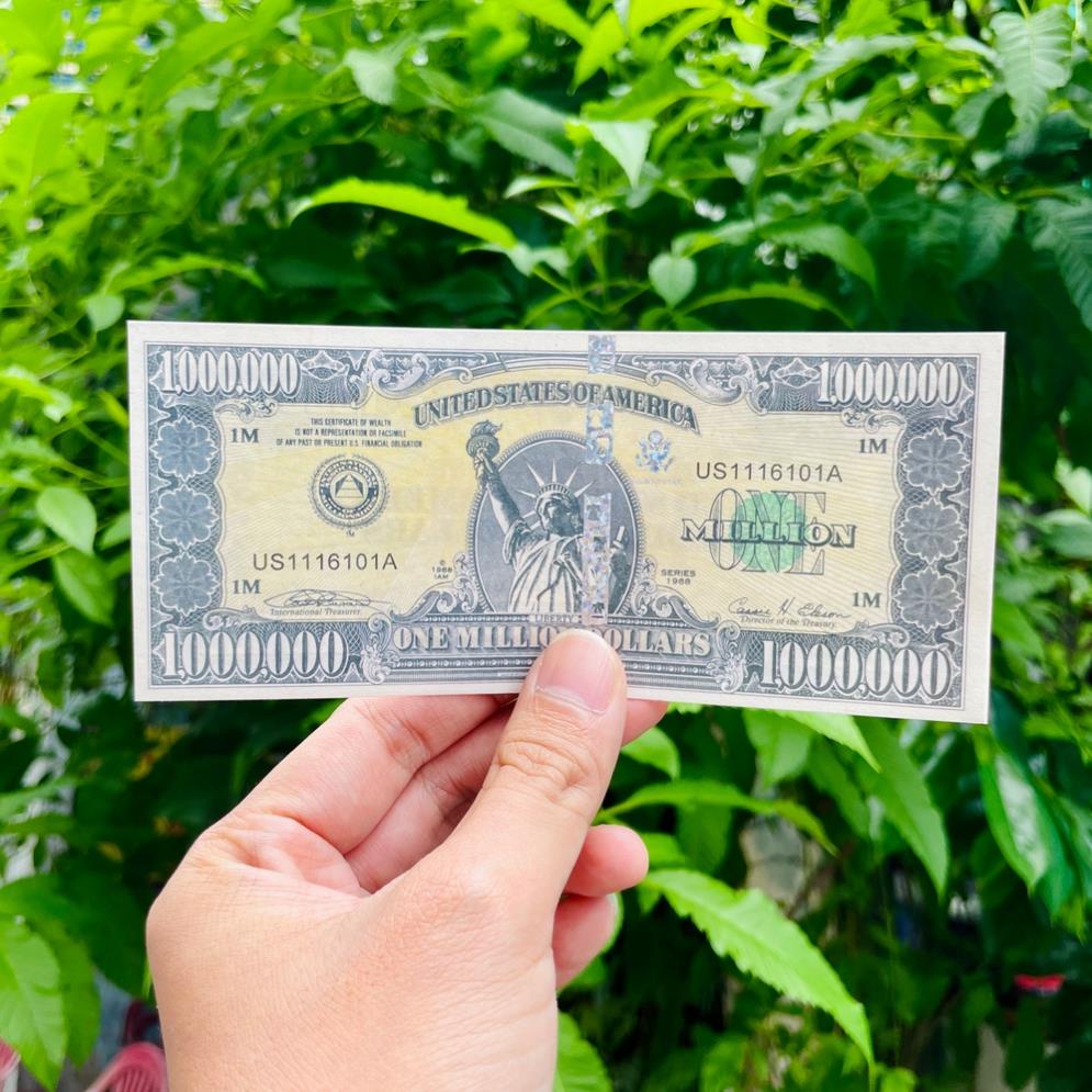 Tiền lưu niệm 1 triệu USD dạ quang; có dây bảo an biến đổi phát quang