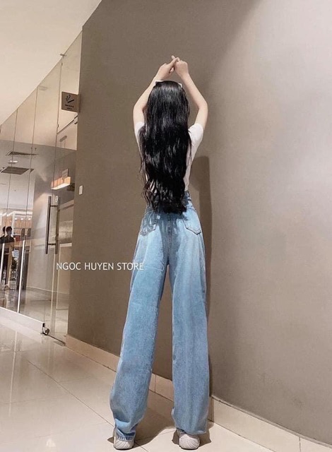 Quần bò xuông xanh nhạt rách gối