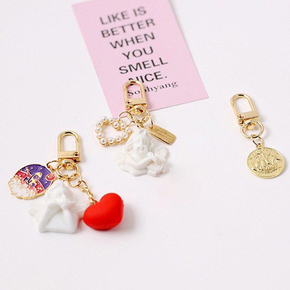 Móc Chìa Khóa Hình Trái Tim Và Ngôi Sao Màu Vàng Kim Dễ Thương Thời Trang Cho Nữ