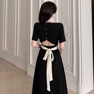 Váy xoè hở lưng thắt nơ