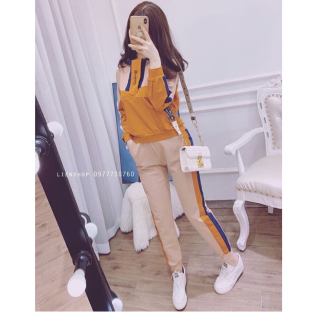 Sỉ bộ thể thao nữ màu cam sữa