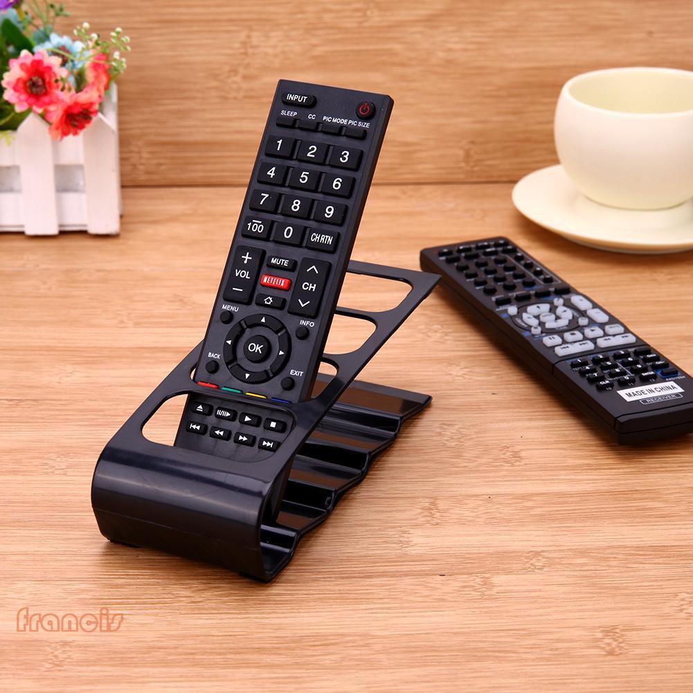 Giá để remote 4 ngăn được làm từ nhựa , dùng sắp xếp điện thoại