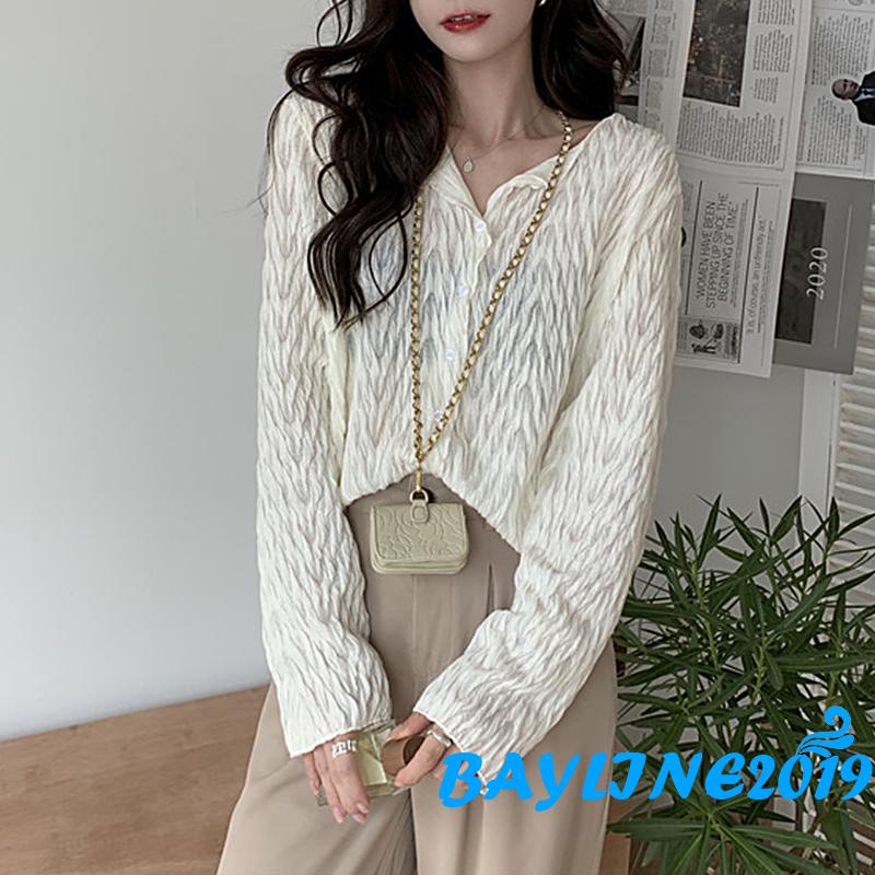 Áo kiểu tay dài cổ chữ V cài nút màu trơn dáng rộng màu be/kaki cho nữ