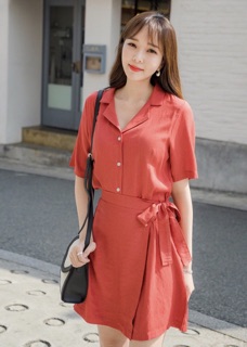 Đầm sơ mi cam đắp tà
