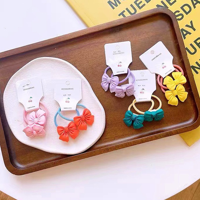 Dây Cột Tóc Co Giãn Đính Nơ Màu Kẹo Dễ Thương Cho Bé Gái