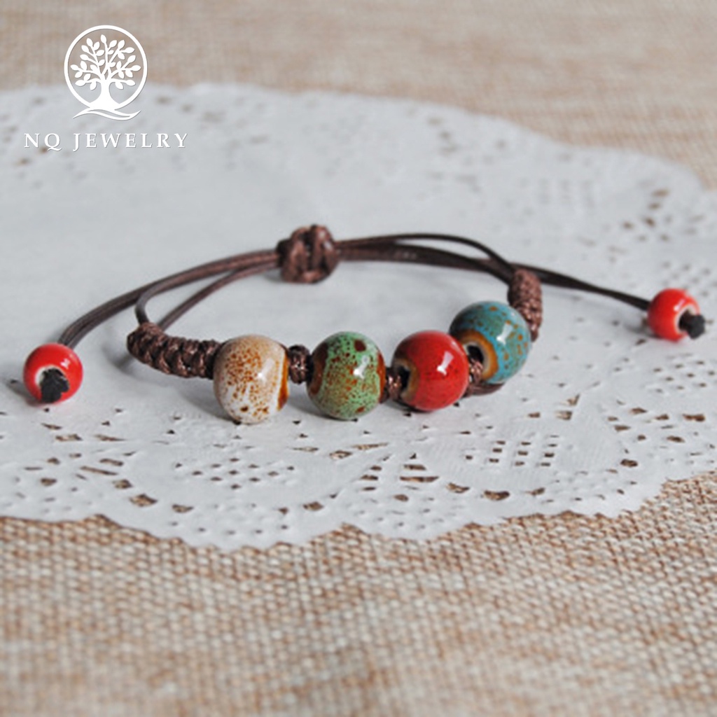 Vòng tay kết dây sáp hạt gốm sứ - NQ Jewelry
