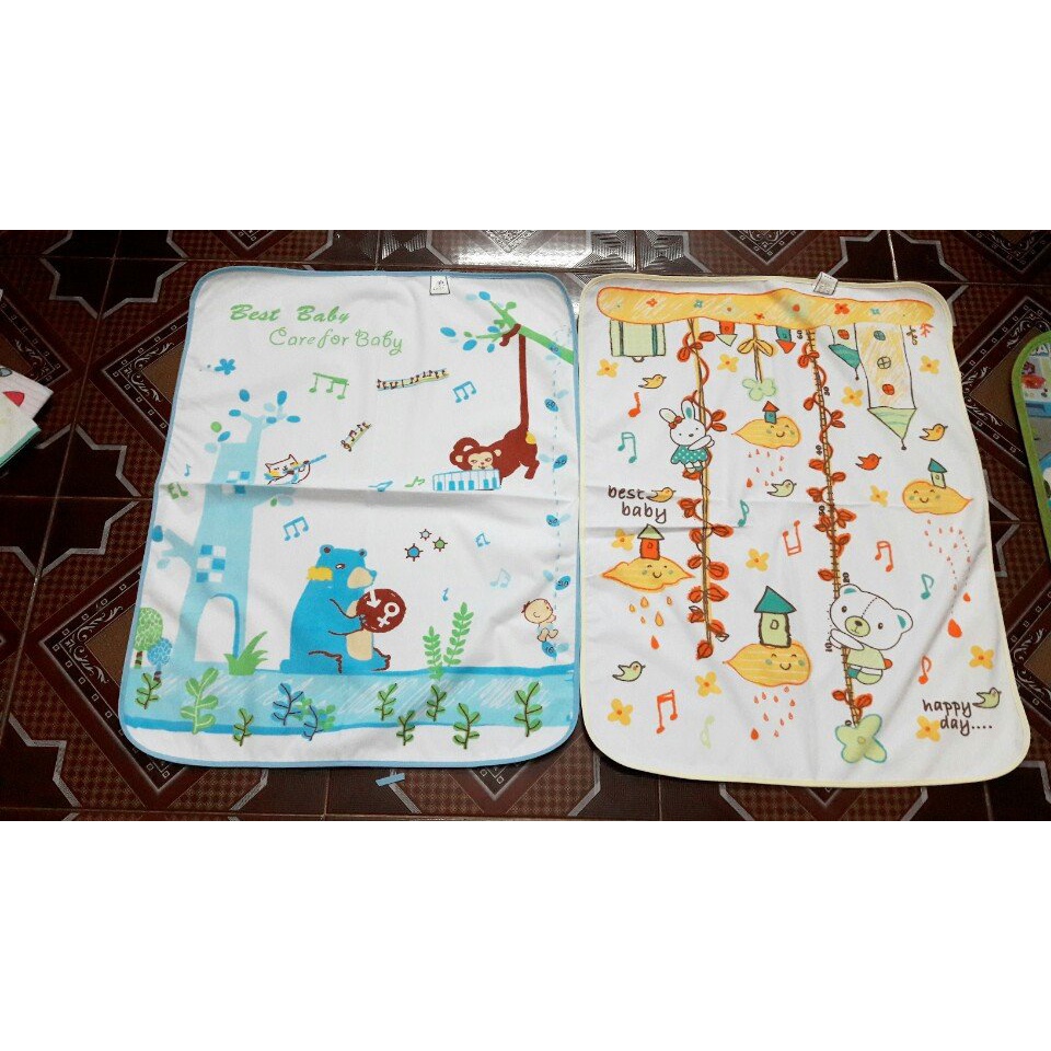 Tấm lót thay bỉm có thước đo chiều cao cho các Bé