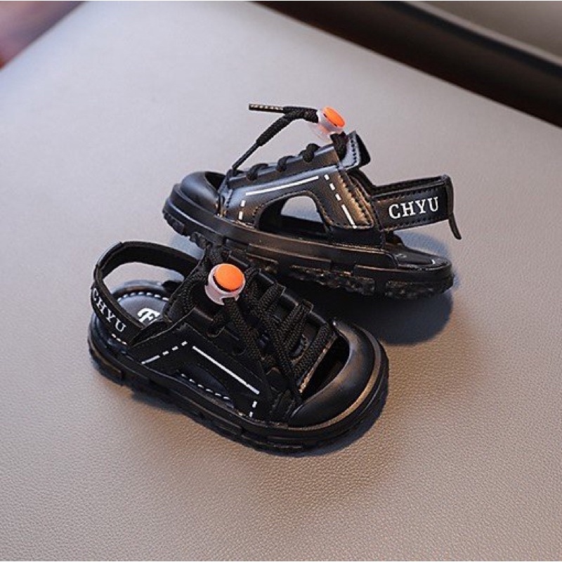 Sandal cho bé trai, bé gái quai dán dây rút độc đáo - dép quai hậu cho bé chống vấp da PU mềm M216(đen,trắng)(sz22-sz31)
