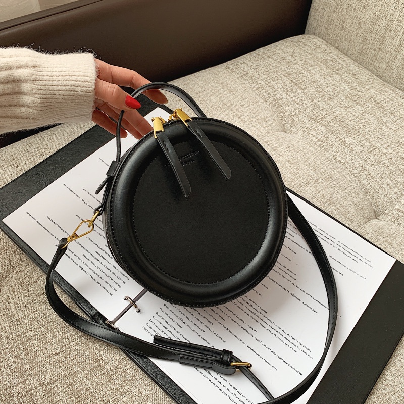 Korean niche design round cake simple retro handbag one shoulder under the bag women's apple small round bag