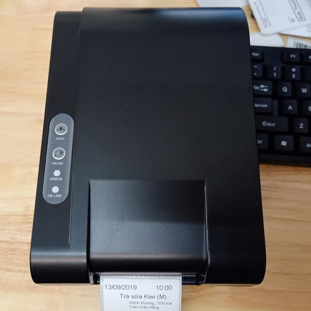 Máy in mã vạch, tem nhiệt trà chanh trà sữa khổ 1 tem giá rẻ Xprinter XP-235B