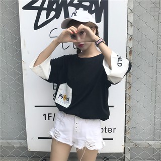 Áo thun nữ dáng rộng cổ tròn tay lỡ thêu chắp vá hình túi ngược có mặt cười dễ thương trẻ trung
