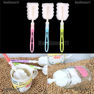 Cọ rửa bình sữa em bé bằng bọt biển