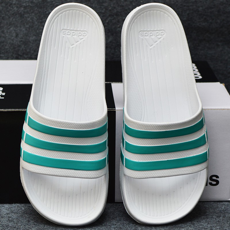 Adidas Duramo màu trắng sọc xanh ngọc