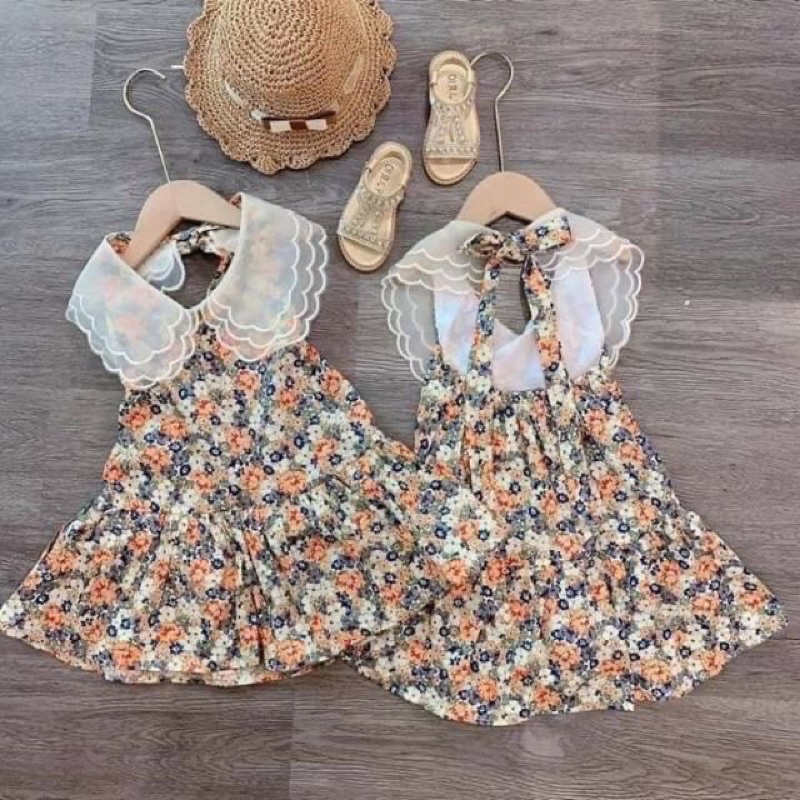 Váy bé gái thô hoa cổ ren hở lưng lẻ size xả sốc