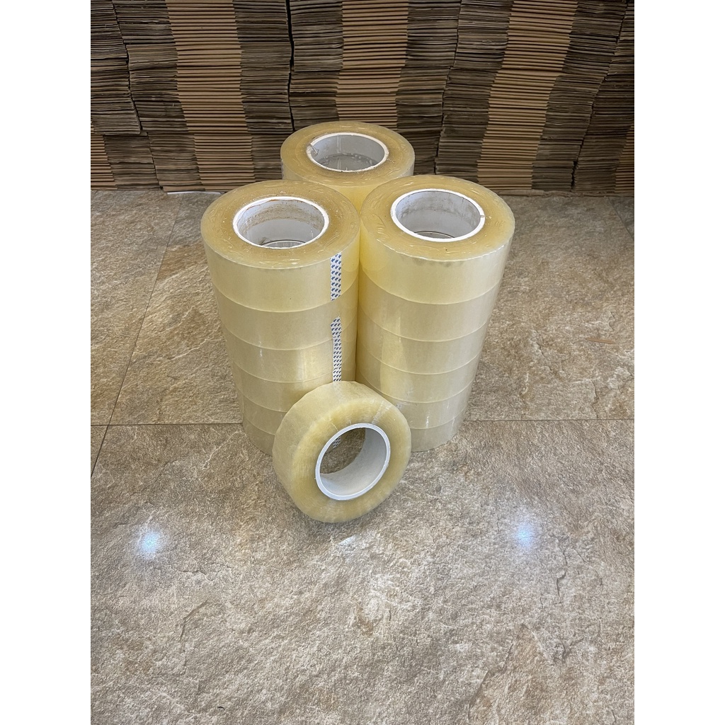 Băng dính màu trắng trong 0,5kg dùng gói hàng COD lõi siêu mỏng - 1 cuộn