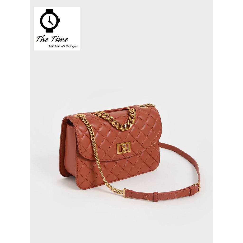 ( Sẵn) Túi Charles and Keith nữ – Charles and Keith Quilted Turn-Lock Clutch CK2-70701062-1 size 22.5x16x9.5cm.