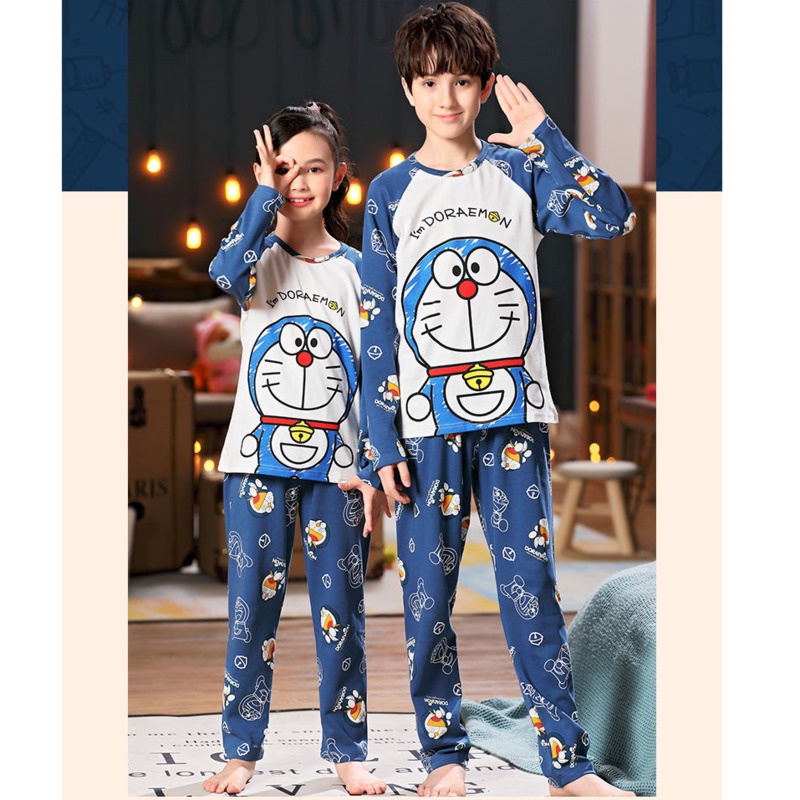 Bộ đồ ngủ cotton tay dài cổ tròn thoáng khí in họa tiết hoạt hình đơn giản thời trang cho trẻ em