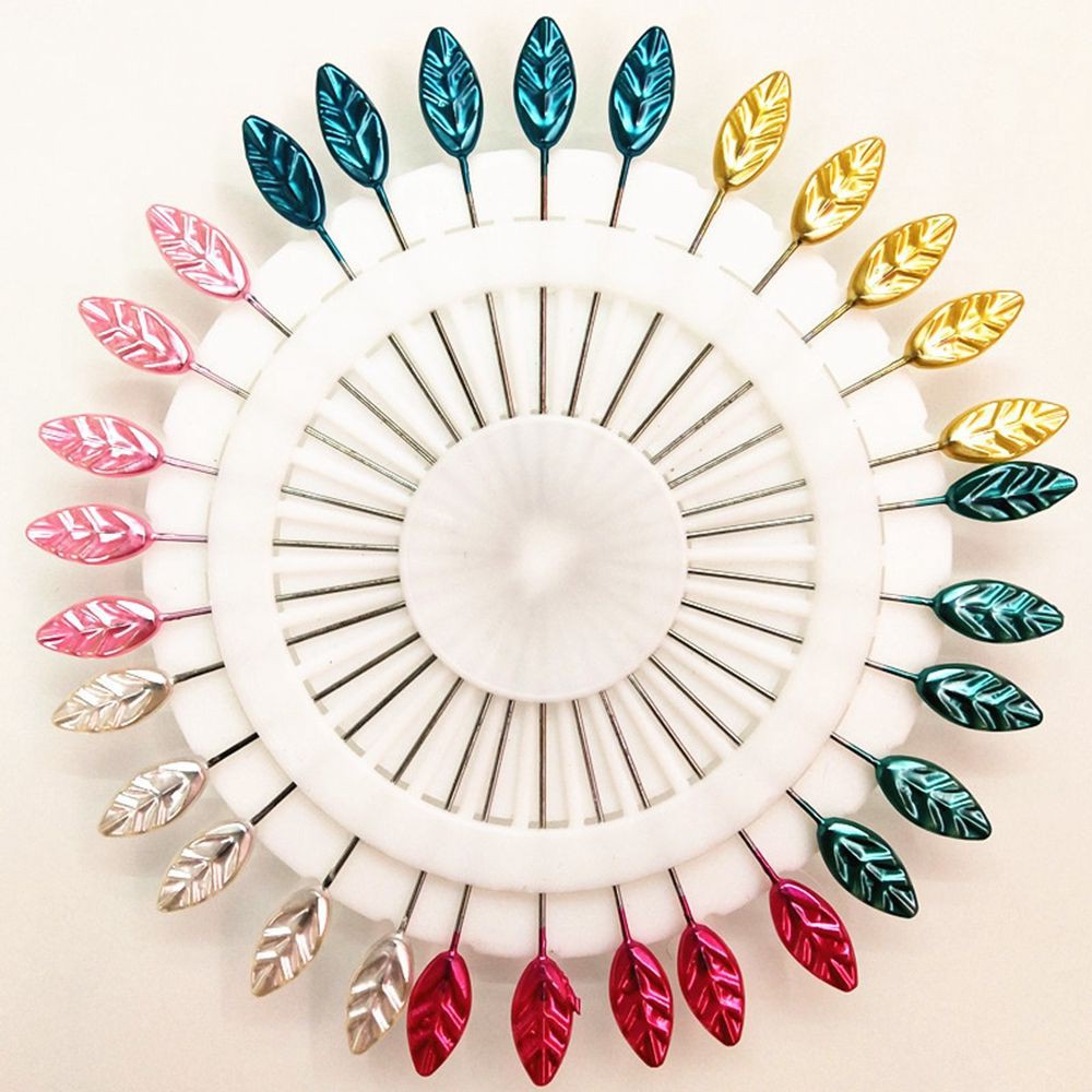 Kim may quần áo nhiều màu