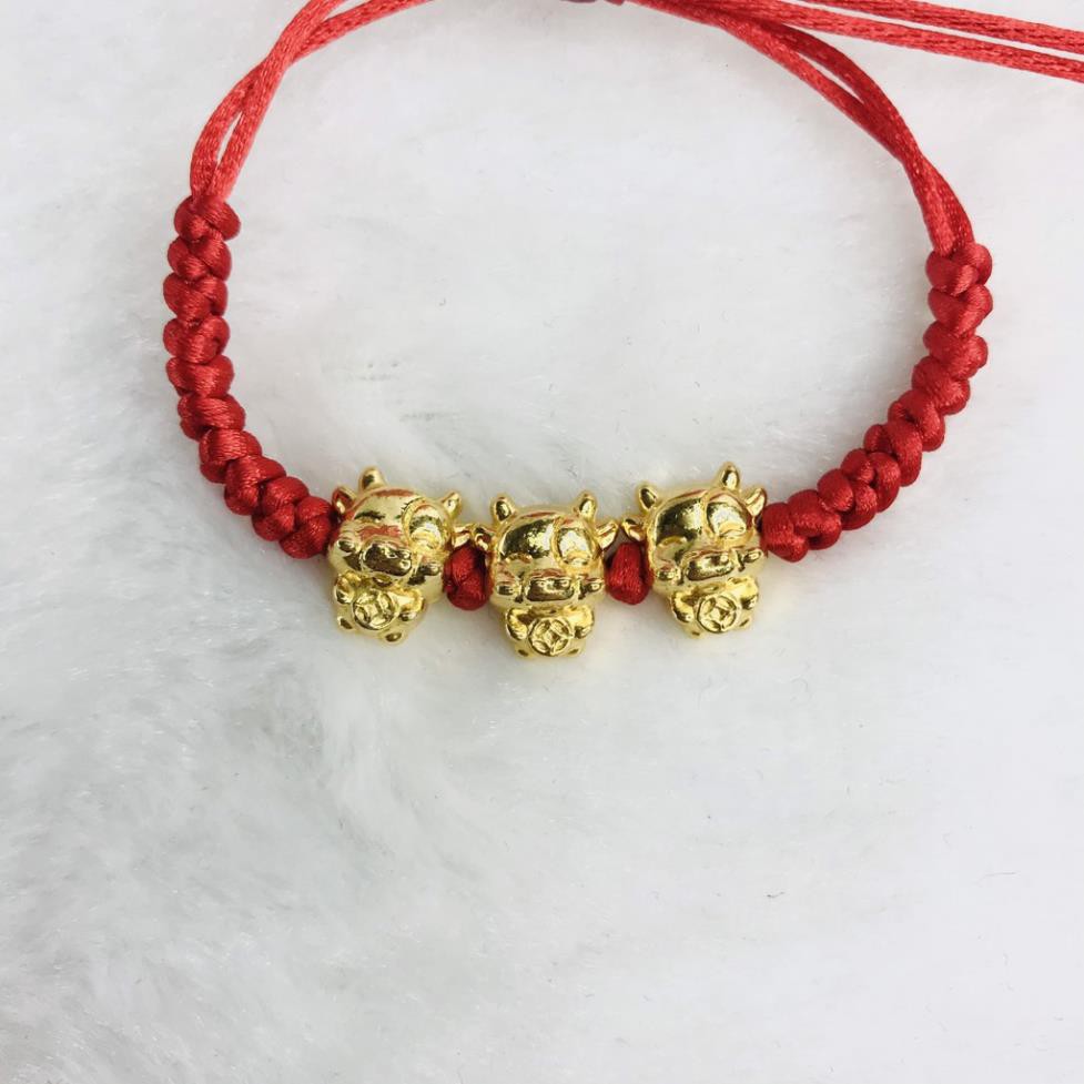 Vòng tay chỉ đỏ trâu vàng rước lộc may mắn