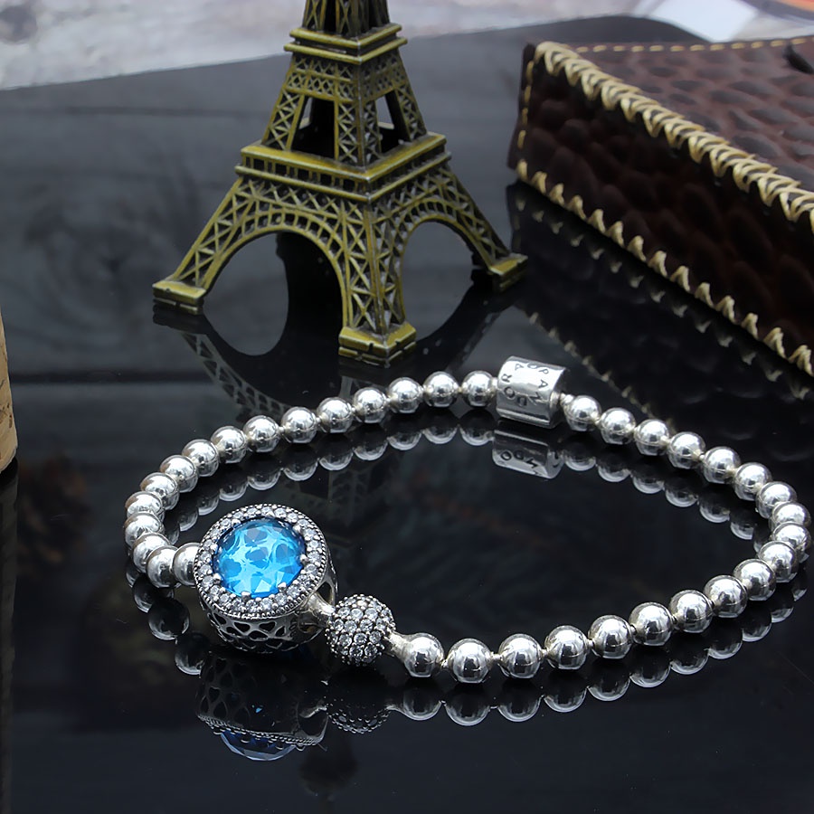 Vòng tay nữ BẠC HIỂU MINH LTU001290055HB charm lồng radian đá lồi