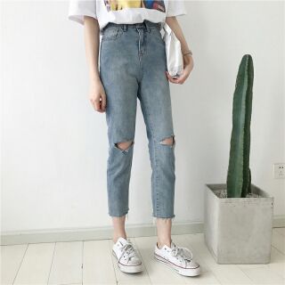 Quần jeans rách gối