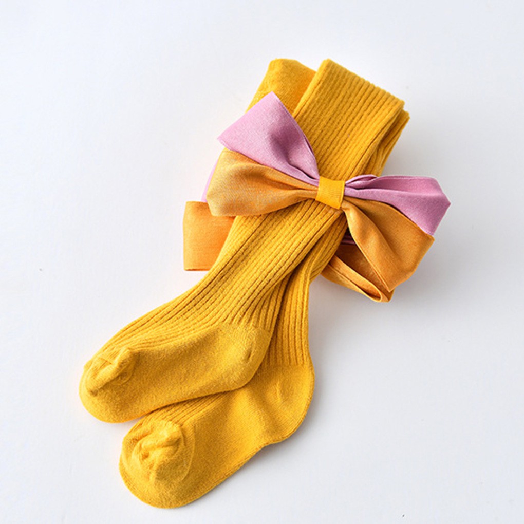 Quần liền tất màu trơn phối nơ thắt dành cho bé gái sơ sinh