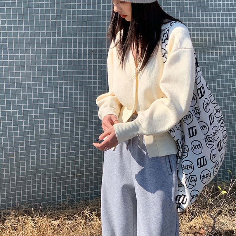 Áo len tăm cardigan tay dài gài khuy xẻ tà cổ V nhẹ nhàng phong cách Hàn Quốc