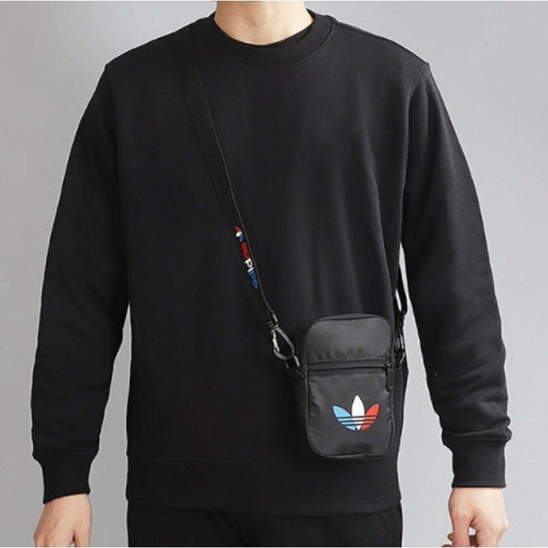 Túi đeo hông A.didass nam nữ đều dùng đc,hàng xuất xịn,size:2,5*12*17.Made ThaiLan