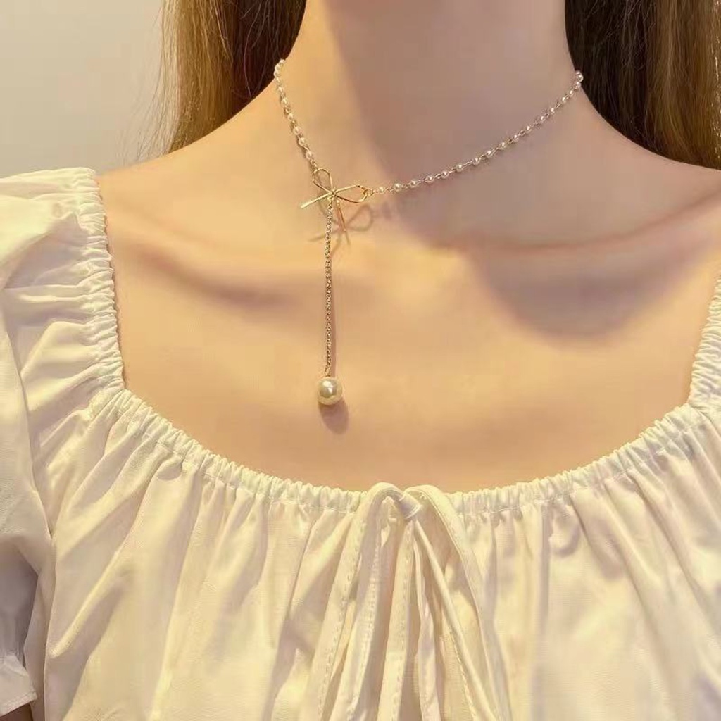 Vòng cổ Mặt Hình Nơ Bằng Đồng Đính Ngọc Trai Giả Dễ Thương Thời Trang Cho Nữ