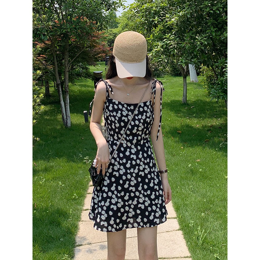 váy 2 dây cúc họa mi nhí điệu đà