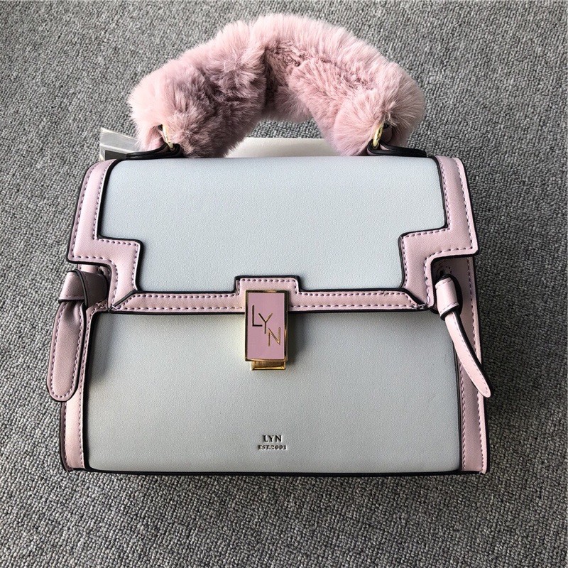 Túi lyn tay cầm lông