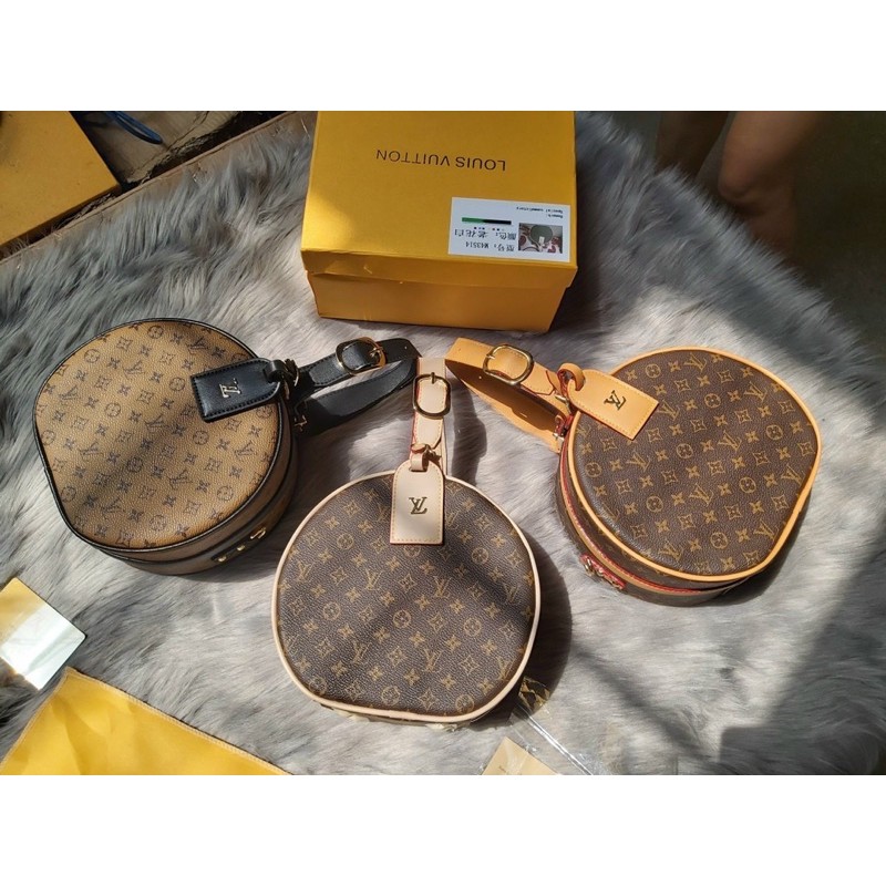 Túi quai xách tròn khoá bấm